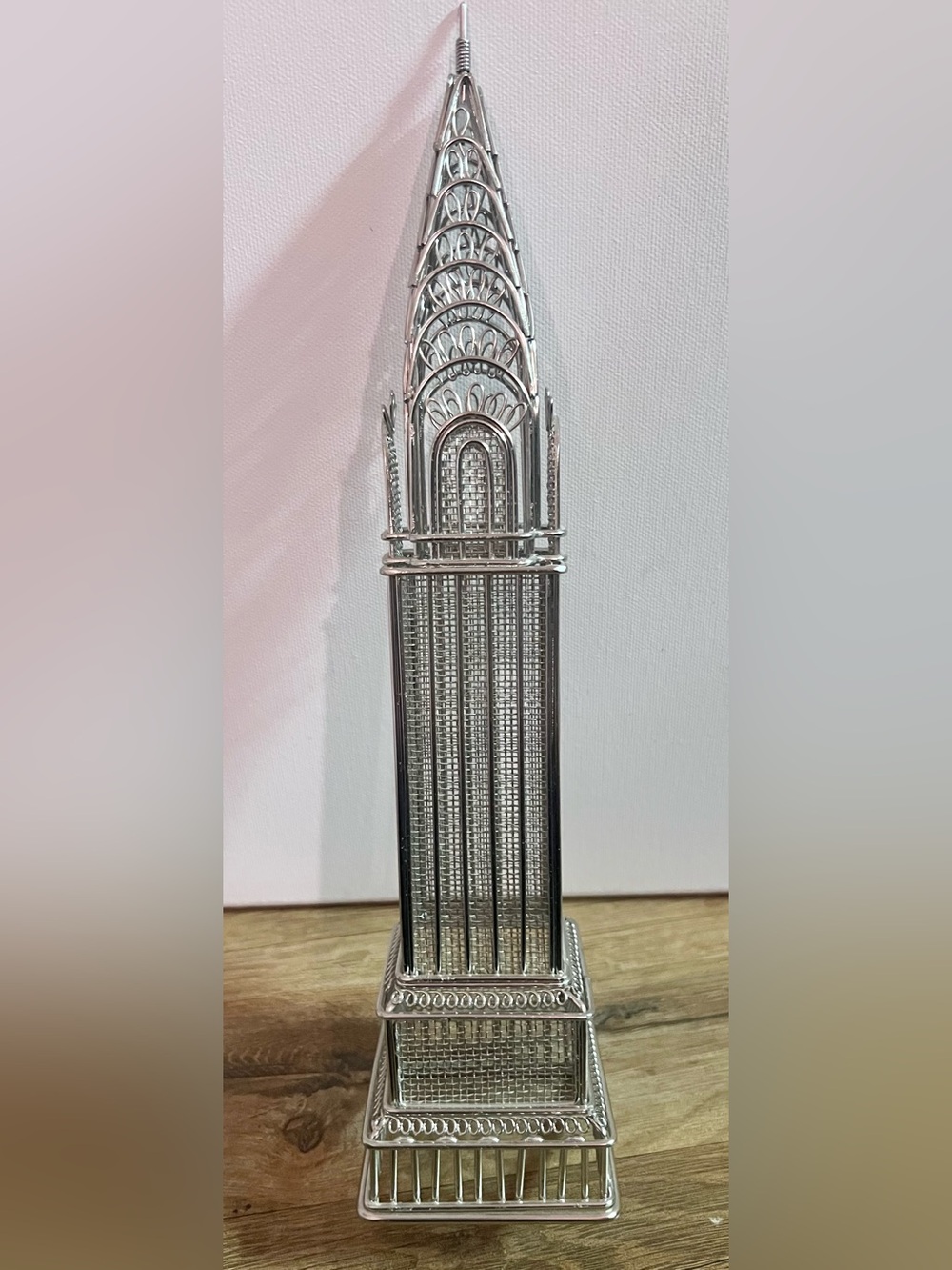 Silver tone wire sculpture of the Chrysler Building